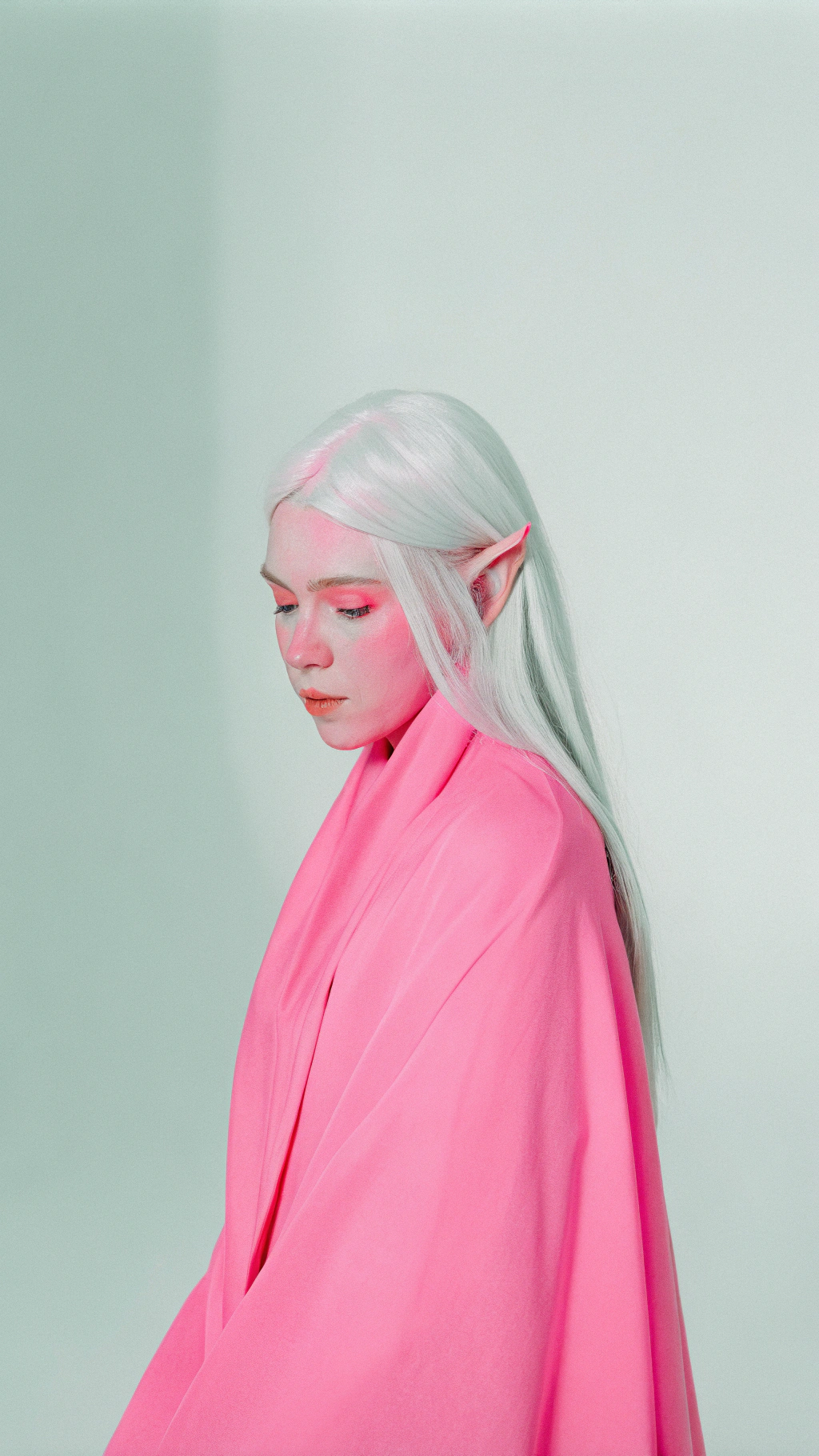 AI generated image by Red Panda AI: portrait of young female elf, cold facial expression, looking down upon