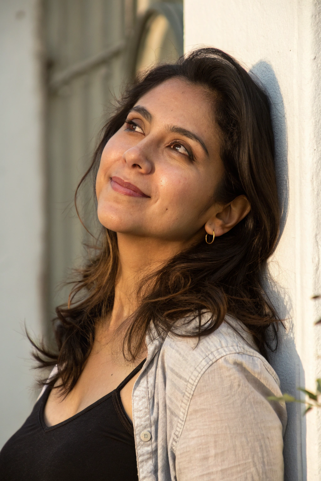 AI generated image by FLUX.1-schnell: A pretty latina woman in her 30s. She is standing in front of a simple background in good lighting