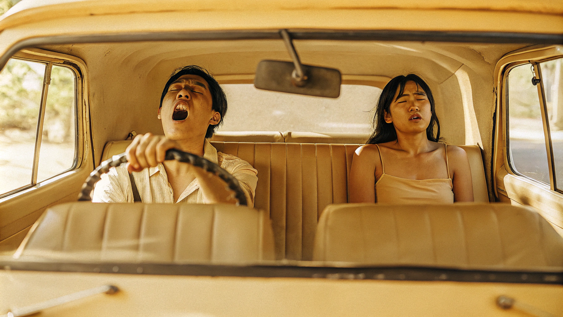 AI generated image by Red Panda AI: A movie still with a gray tone. The setting is in Korea. A worn-out van’s driver’s seat has a man in his 30s yawning with a bored expression. Seated next to him, a woman in her 30s wearing a tank top glares at him.