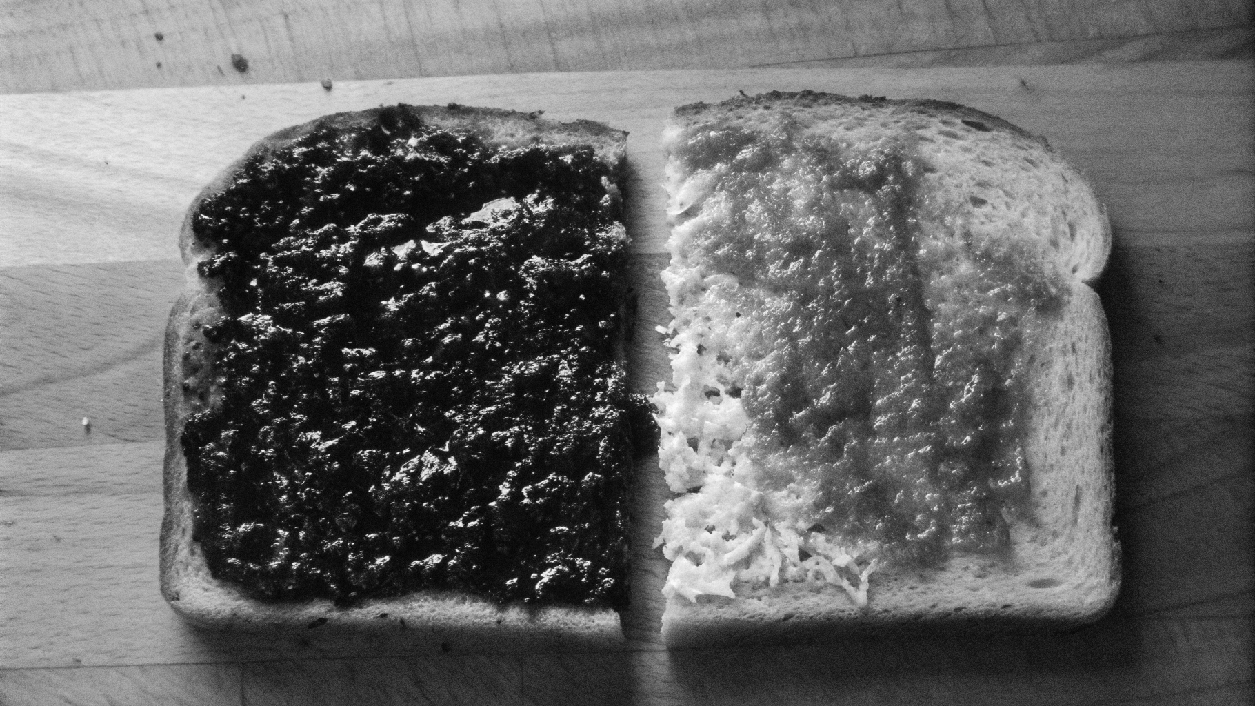 AI generated image by Recraft V3: bread with Vegemite and coconut Sambol