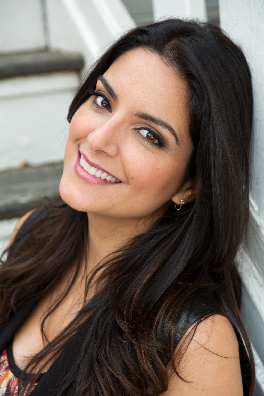 AI generated image by FLUX.1-schnell: A pretty latina woman in her 30s. She is facing the camera