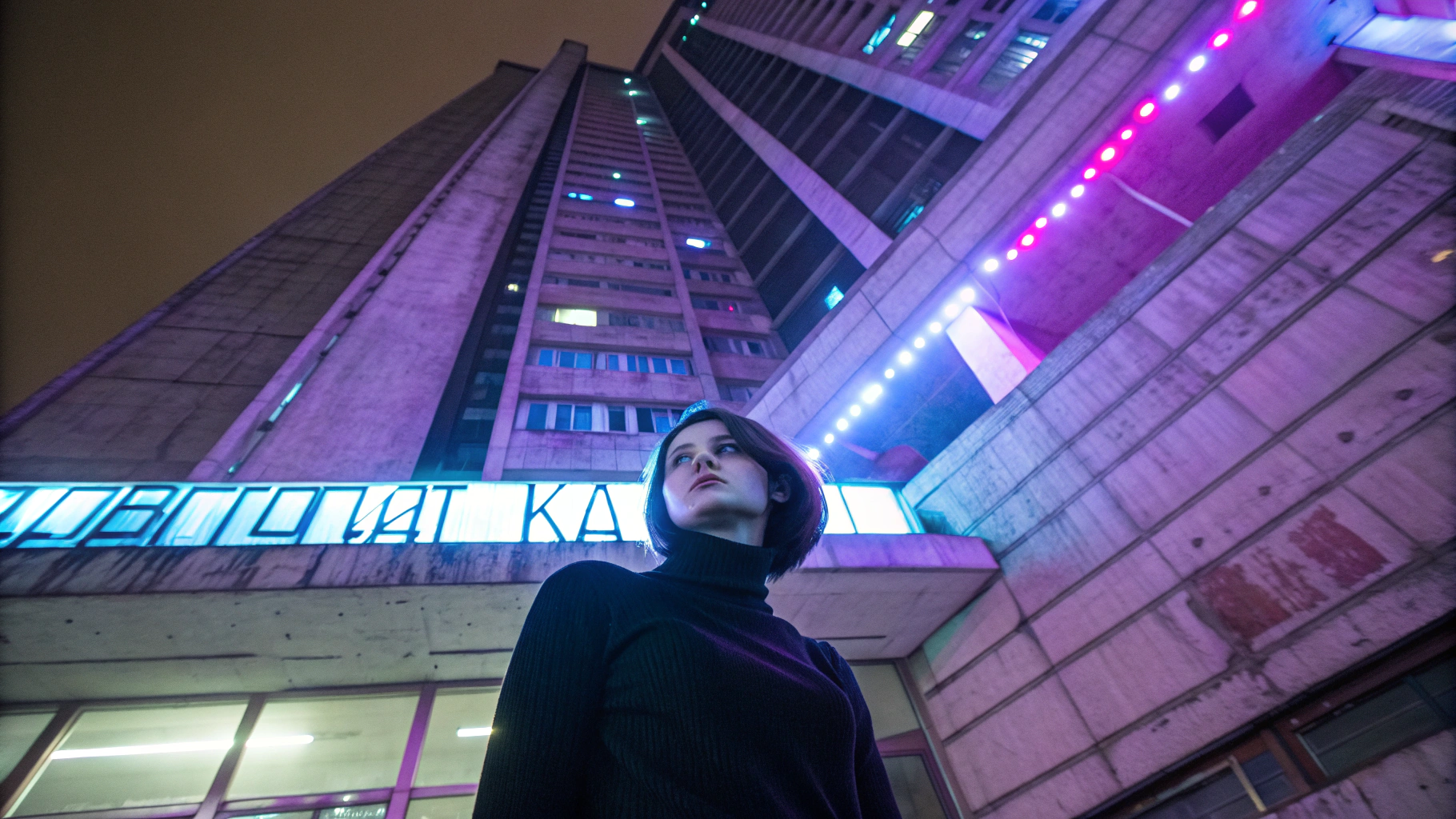 AI generated image by Red Panda AI: A brutalist high-rise building at night, viewed from below, creating a dramatic vertical perspective. In the foreground, a young woman with pale skin and short dark hair in a black turtleneck, her face partially obscured by static/glitch effects. The building is illuminated by harsh purple and blue neon lights that reflect off the concrete. Soviet-era technical diagrams and Cyrillic text ('АВТОМАТИКА') overlay the image like a transparent blueprint. The atmosphere is cold and dystopian, with a light fog effect. Retrofuturistic synth-wave elements blend with Soviet industrial aesthetics. The woman's expression is melancholic but determined. Digital distortion effects appear mostly in the corners, creating a frame. The overall color palette focuses on deep purples, electric blues, and cold greys.