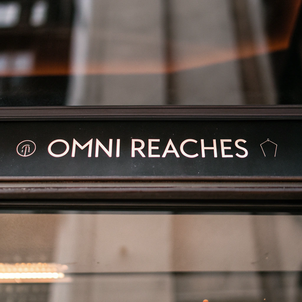 AI generated image by Red Panda AI: Can you create a logo for an sales and AI marketing orchestration system Omni Reaches that ties in the entire customer journey and reacts based on all user events. The company name is Omni Reaches 