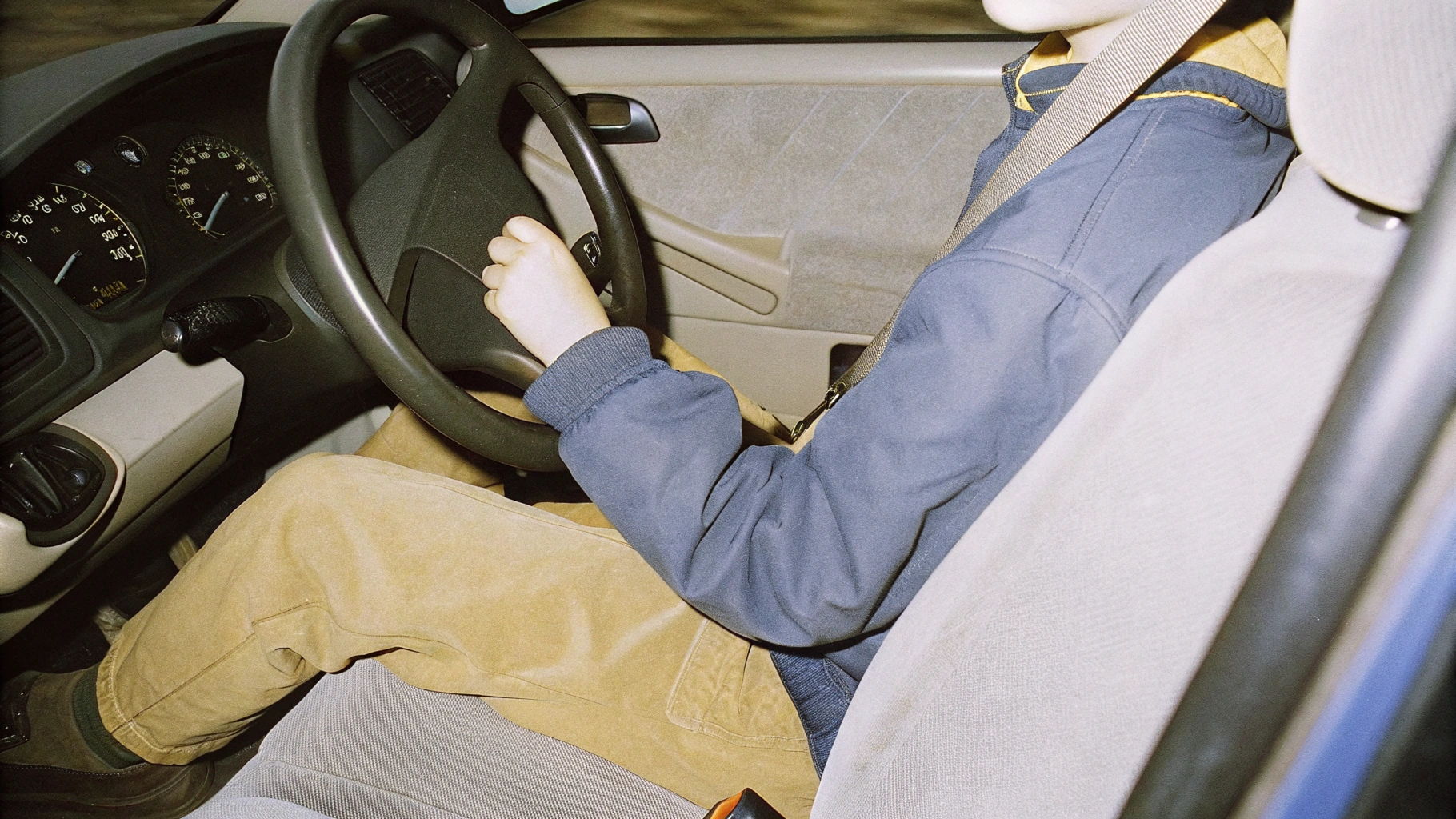 AI generated image by Red Panda AI: Kid drive vw golf 5 