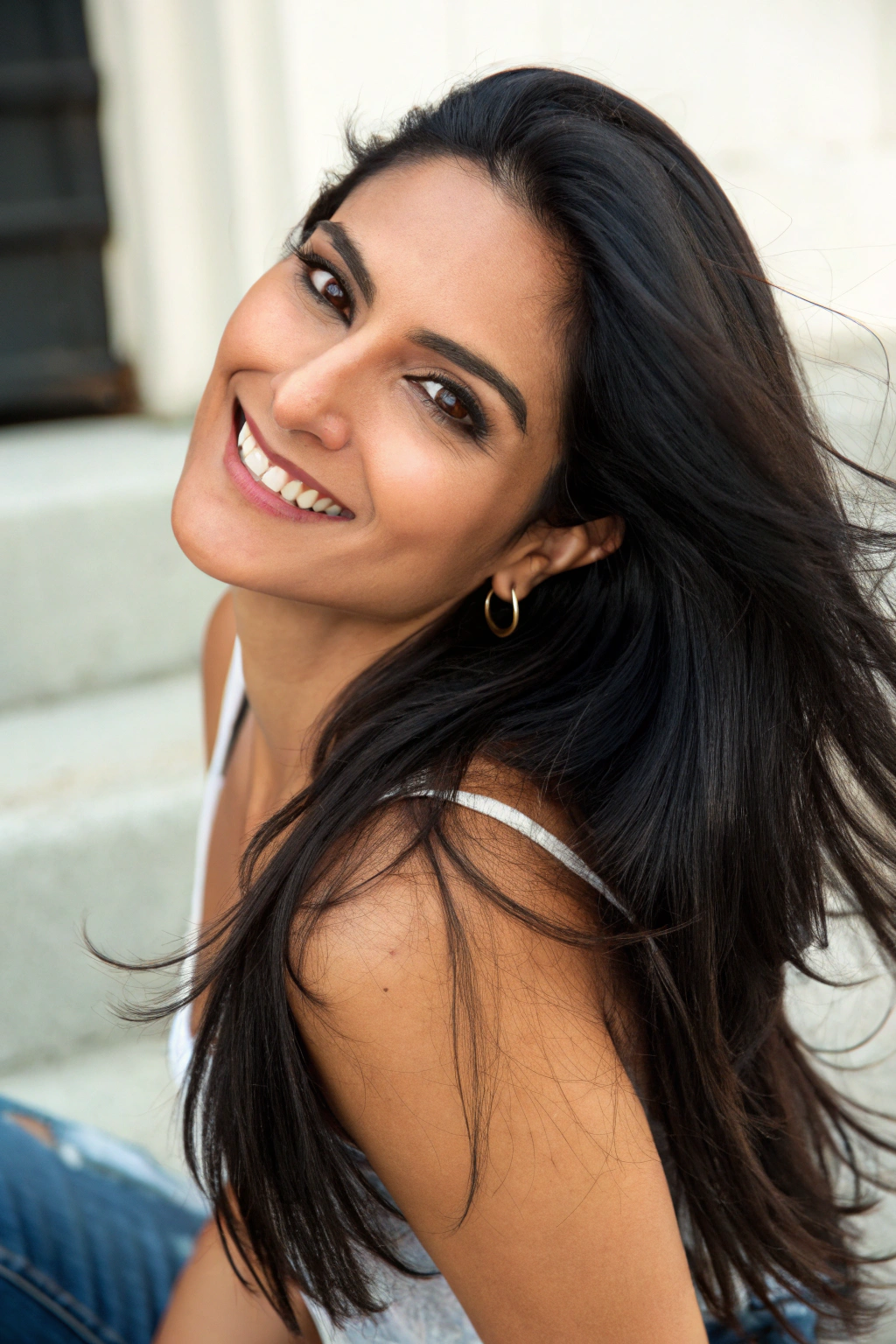 AI generated image by FLUX.1-schnell: A pretty latina woman in her 30s. The photo is for her dating app profile