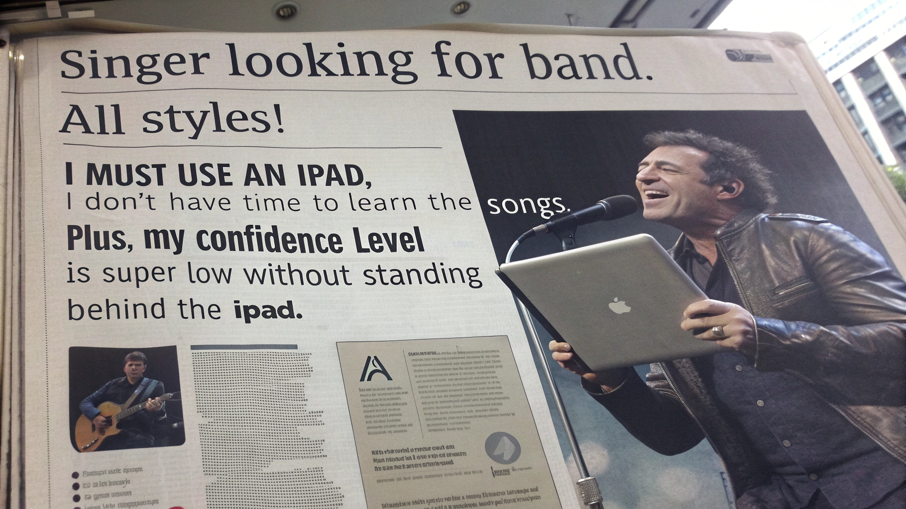 AI generated image by Red Panda AI: Newsaper ad reads: "Singer looking for band.  All styles!  I must use an iPad, though.  I don't have time to learn the songs.  Plus, my confidence level is super low without standing behind the iPad."