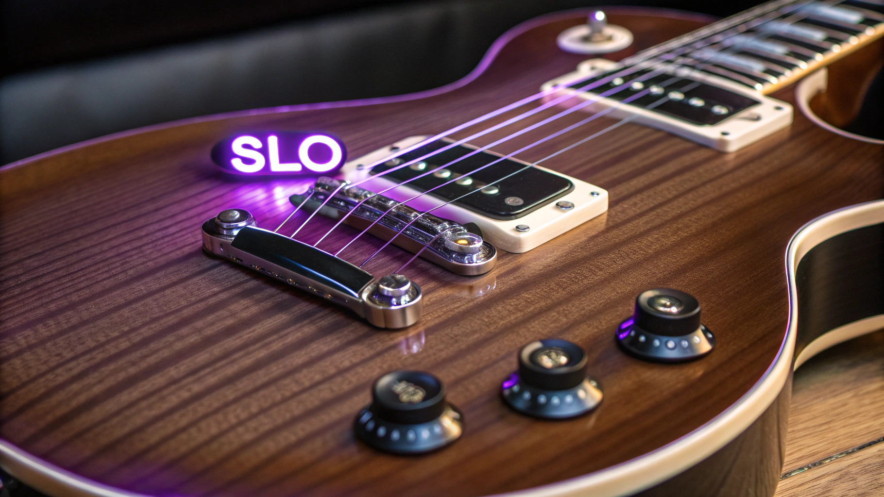 AI generated image by Red Panda AI: A hyper-realistic Les Paul guitar, featuring custom pickups illuminated with neon letters "SLO" glowing in vibrant purple, crisp white, and deep black. Studio lighting highlights polished chrome hardware, glossy wood grain, and intricate electronic details. Photographic close-up.