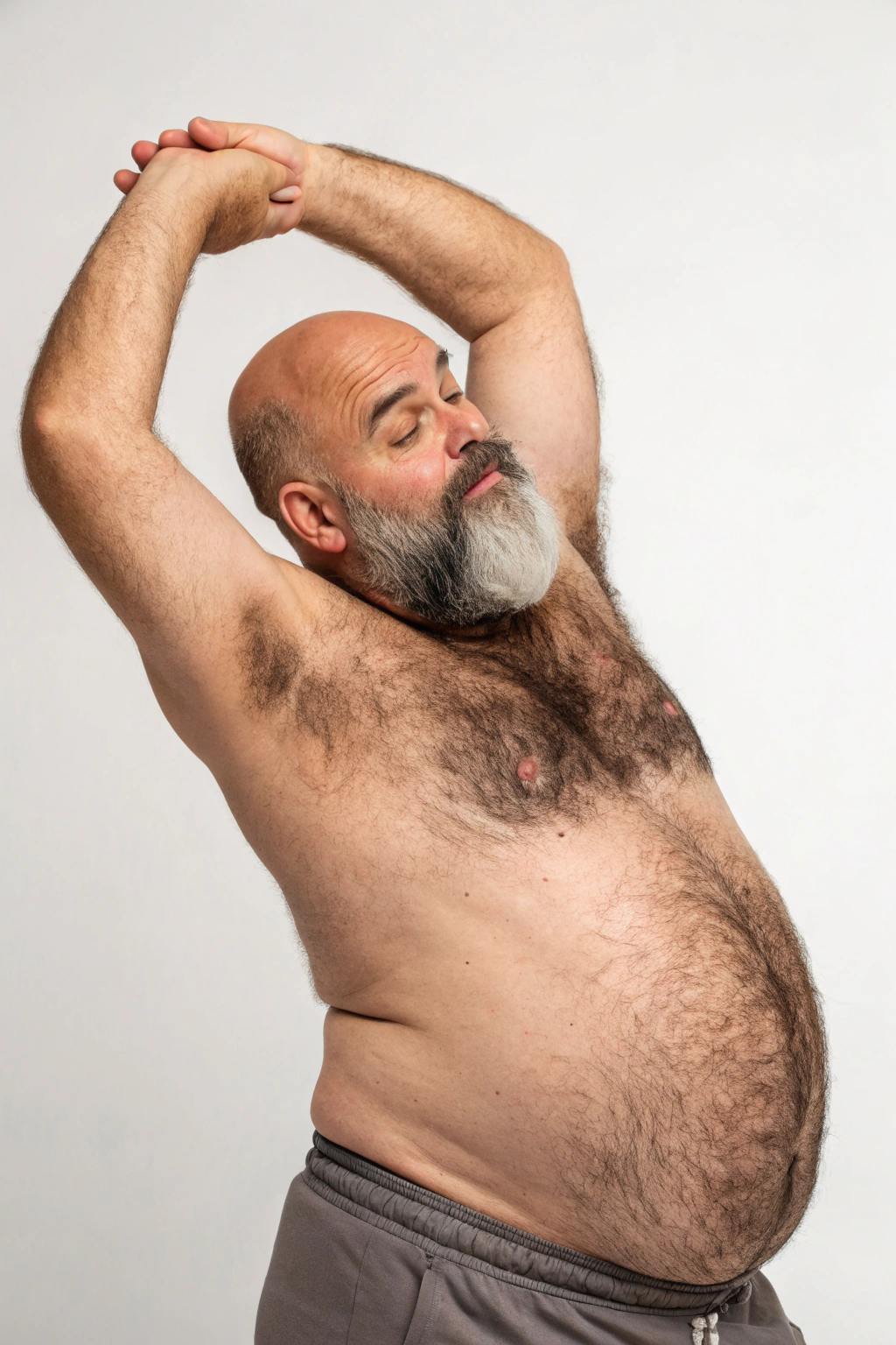 AI generated image by Red Panda AI: a studio shot of a bulky and slightly overweight 50 year old hirsute dad stretching. Man has heavy amount of body hair, hairy chest pattern, expanding his bloated heavy bearded-belly, bald head, brown and white beard