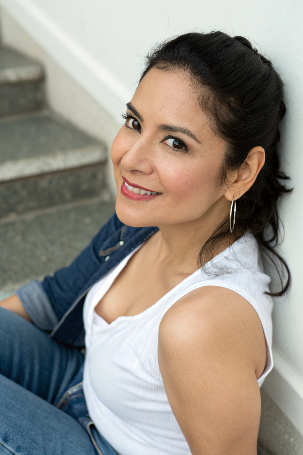 AI generated image by FLUX.1-schnell: A pretty latina woman in her 30s. This is a photo for her dating app profile. She is looking at the camera